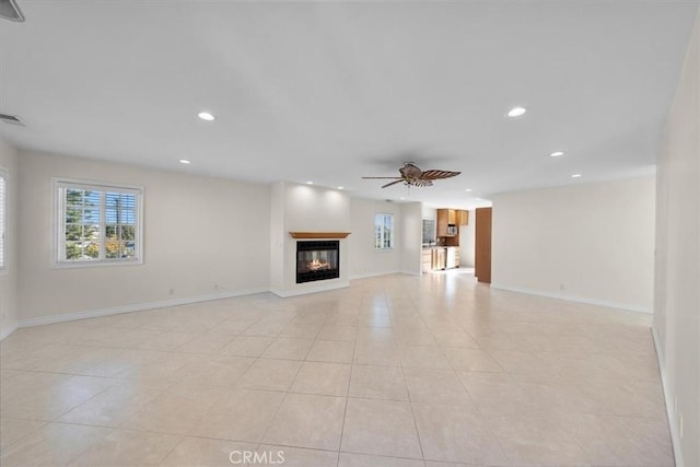 4601 W 191st St, Torrance, CA 90503 - unfurnished living room featuring recessed lighting, baseboards, light tile patterned flooring, ceiling fan, and a glass covered fireplace