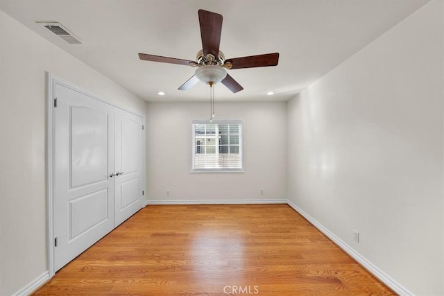 unfurnished bedroom with recessed lighting, visible vents, light wood-style flooring, and baseboards