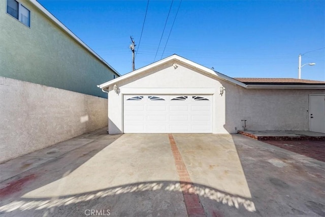 garage with driveway