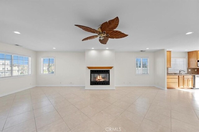 4601 W 191st St, Torrance, CA 90503 - unfurnished living room featuring recessed lighting, a sink, baseboards, and ceiling fan
