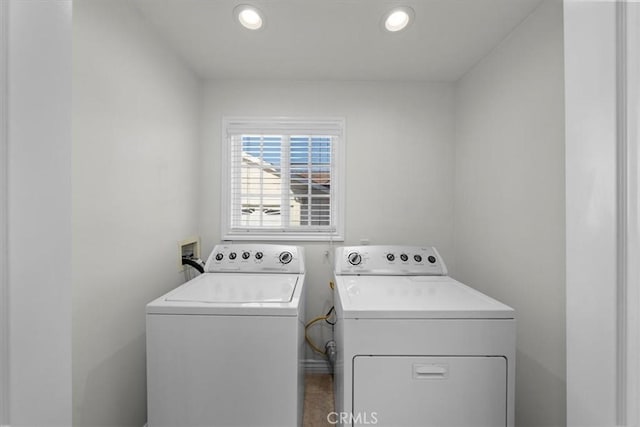 washroom featuring washer and dryer, recessed lighting, and laundry area