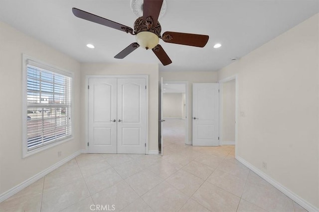 unfurnished bedroom with baseboards, ceiling fan, light tile patterned floors, recessed lighting, and a closet