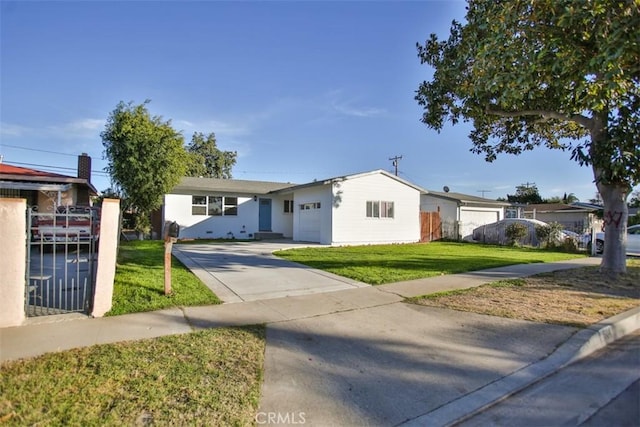 ranch-style house featuring a front lawn and a garage