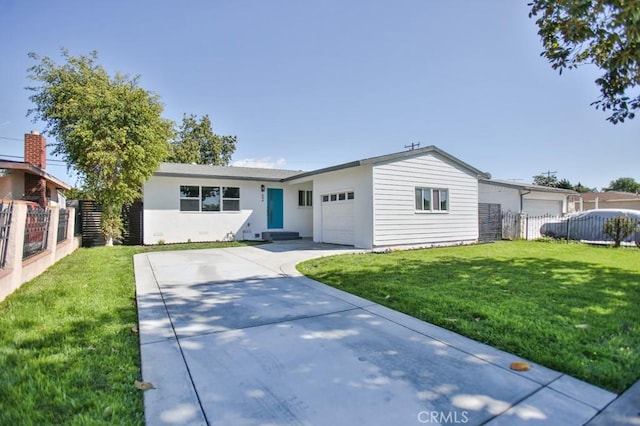 ranch-style house featuring a garage, a front yard, fence, and driveway