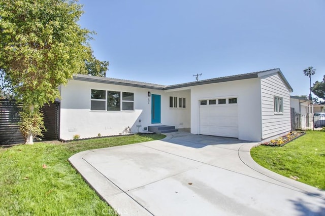 ranch-style home with driveway, a front lawn, an attached garage, and stucco siding