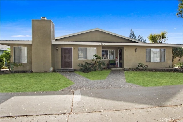 view of front of house with a front lawn