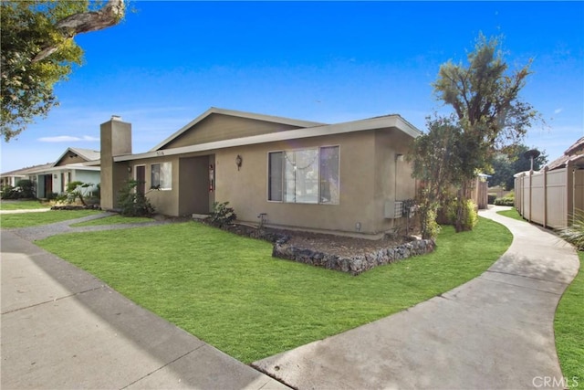 view of front facade with a front lawn