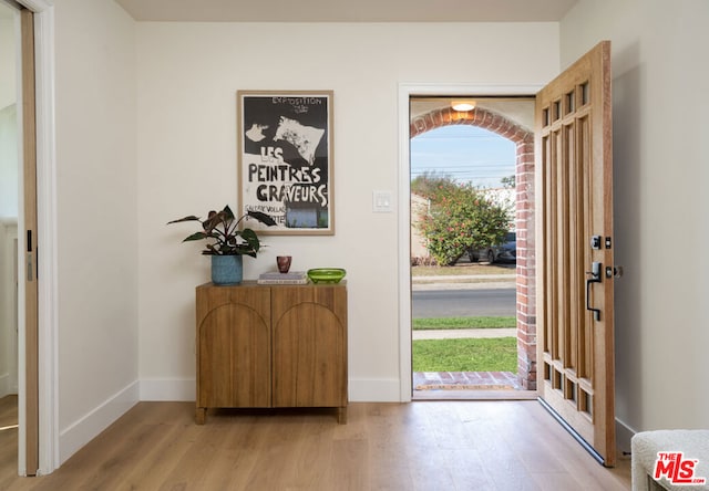 foyer with light wood-type flooring