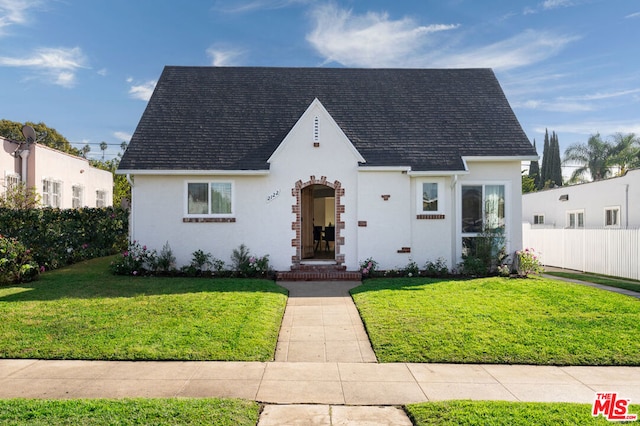 view of front of home with a front yard