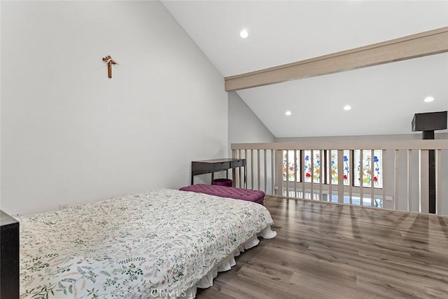 bedroom featuring beamed ceiling, high vaulted ceiling, and hardwood / wood-style flooring