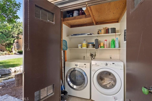 laundry area with washer and clothes dryer