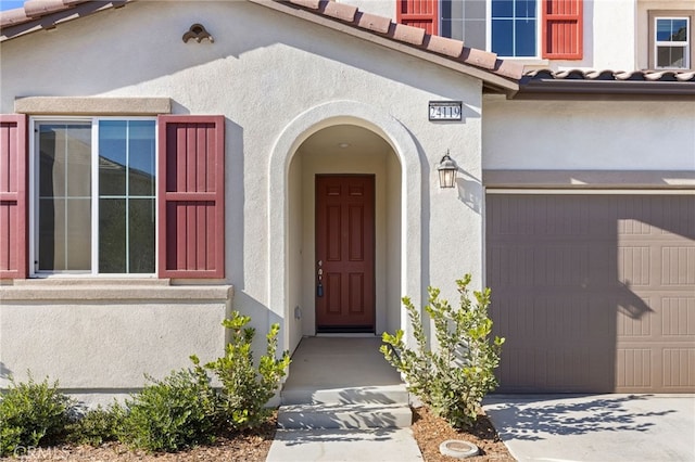 entrance to property with a garage