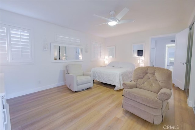 bedroom featuring ceiling fan and light hardwood / wood-style floors