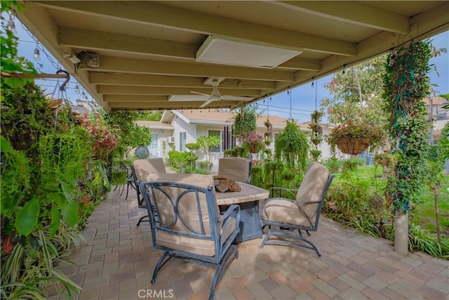 view of patio / terrace featuring ceiling fan