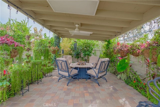 view of patio featuring ceiling fan