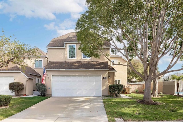 view of front of home featuring a front lawn and a garage