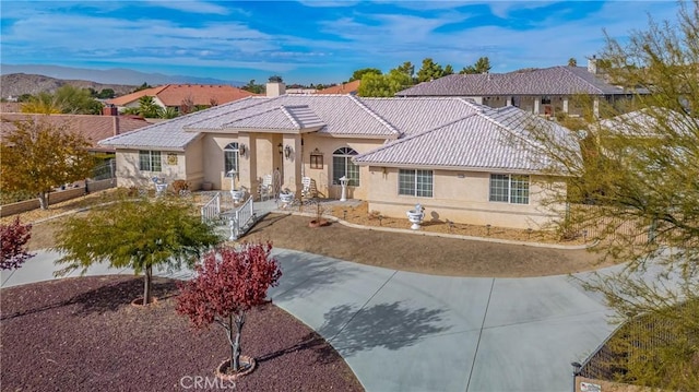 view of front of home with a mountain view