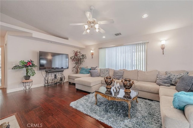 living room with dark hardwood / wood-style floors, vaulted ceiling, and ceiling fan