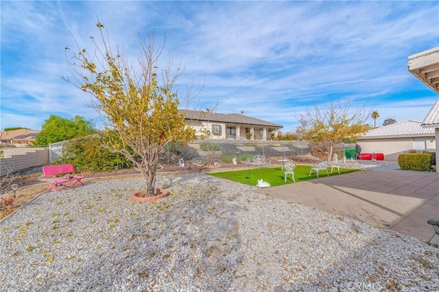 view of front of property featuring a patio