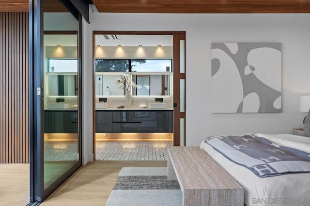 bedroom featuring light hardwood / wood-style floors