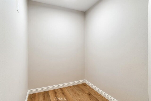 empty room featuring wood-type flooring