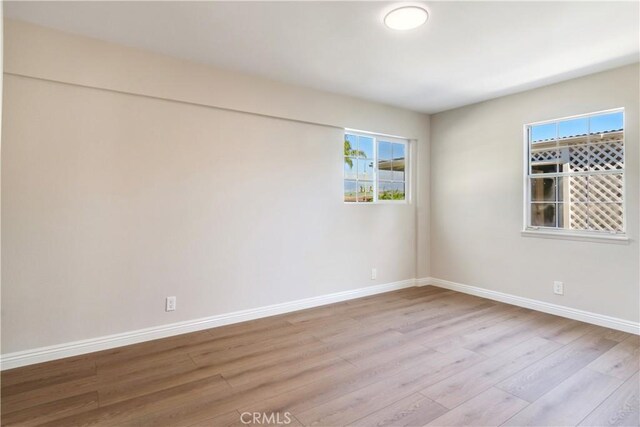 empty room featuring light hardwood / wood-style floors