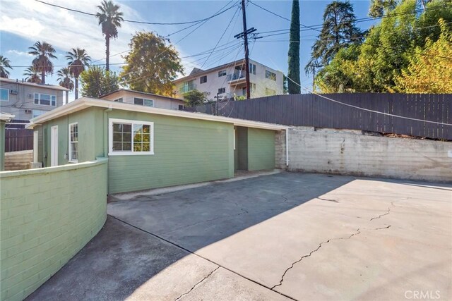 view of home's exterior with a patio area