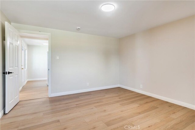 empty room featuring light hardwood / wood-style flooring