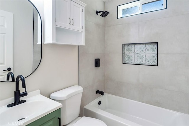 full bathroom featuring vanity, toilet, and tiled shower / bath combo