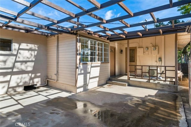 exterior space with a pergola and a patio area