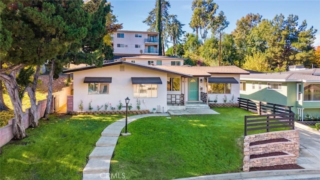 view of front of house with a front lawn