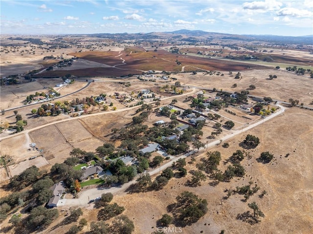 bird's eye view with a mountain view and a rural view