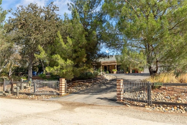 view of property hidden behind natural elements