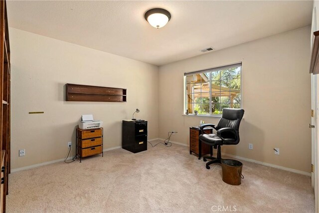 home office featuring light carpet