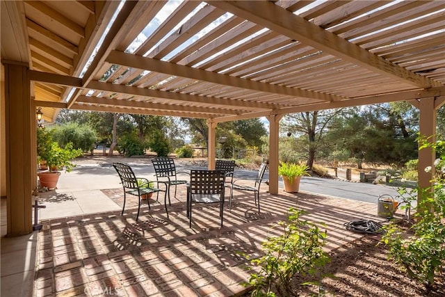 view of patio featuring a pergola