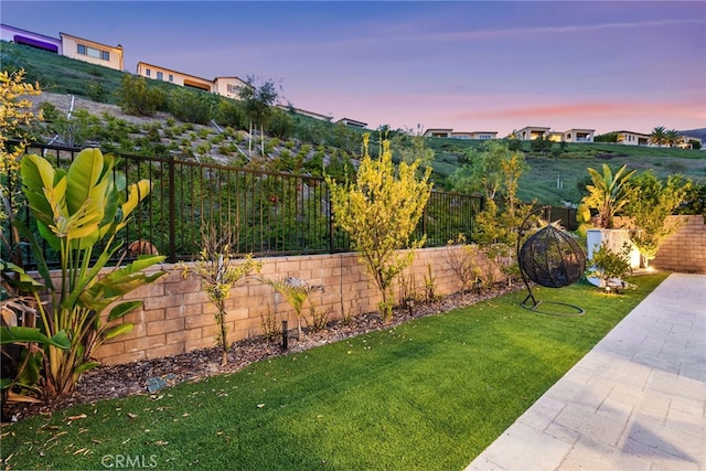 yard at dusk with fence