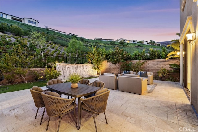 view of patio with a fenced backyard and an outdoor hangout area