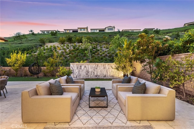 view of patio with outdoor lounge area and a fenced backyard