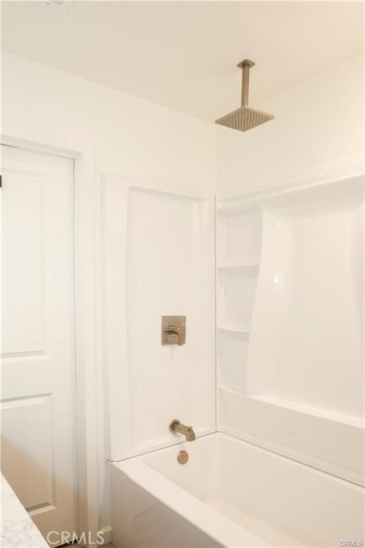 bathroom featuring tub / shower combination