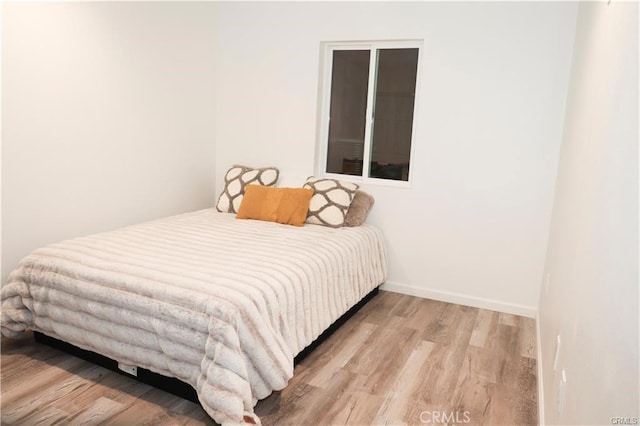 bedroom featuring light hardwood / wood-style flooring