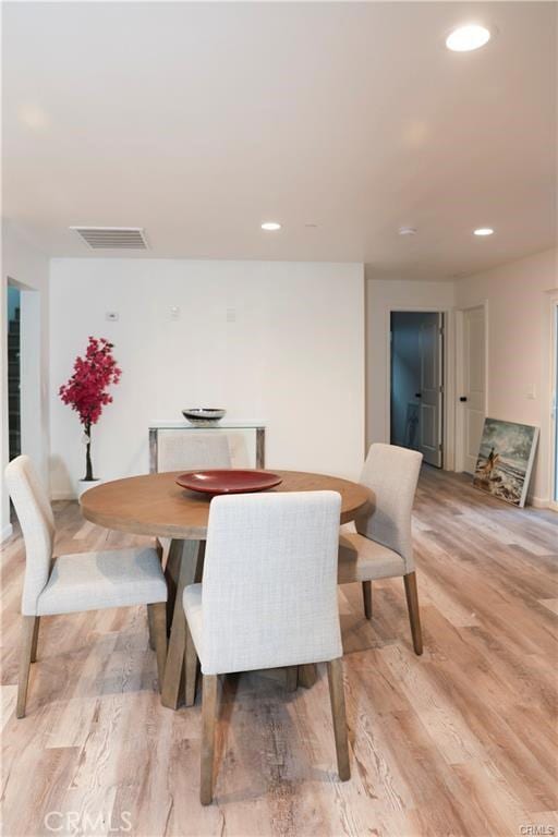 dining room featuring light hardwood / wood-style flooring