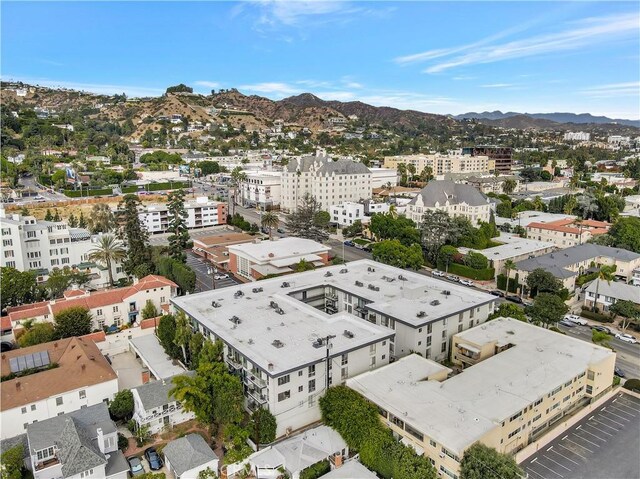 drone / aerial view featuring a mountain view