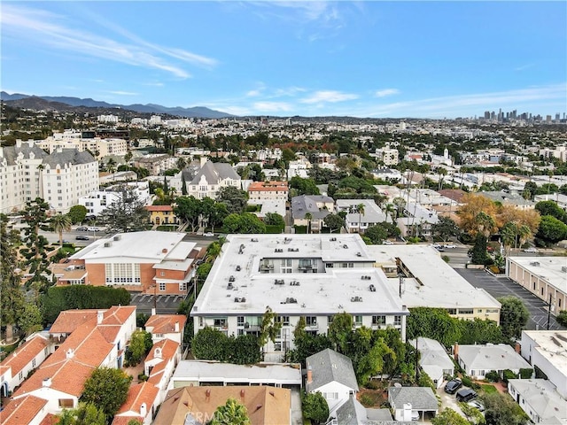 birds eye view of property featuring a mountain view