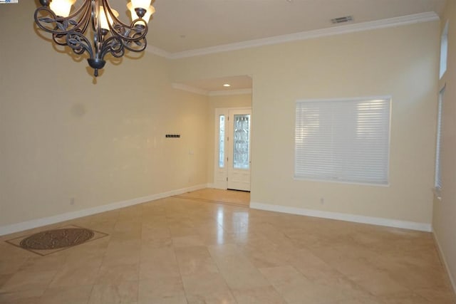 empty room with light tile patterned floors, crown molding, and a chandelier