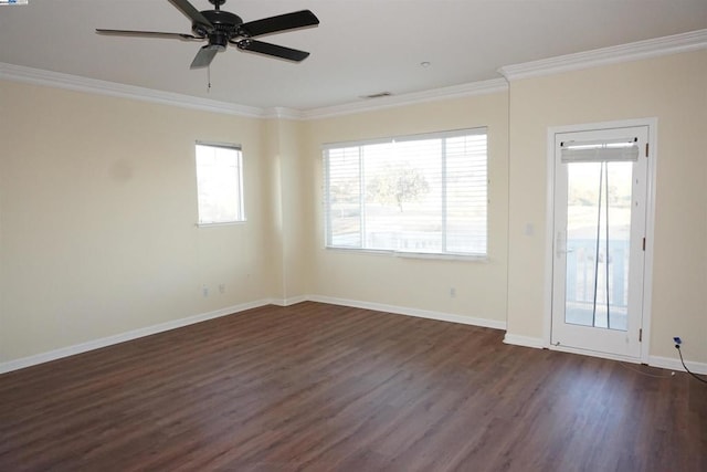 unfurnished room with crown molding, ceiling fan, and dark hardwood / wood-style floors