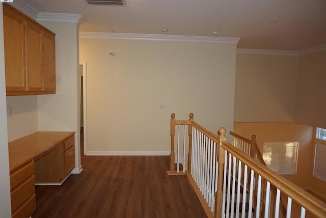 hallway with crown molding and dark wood-type flooring