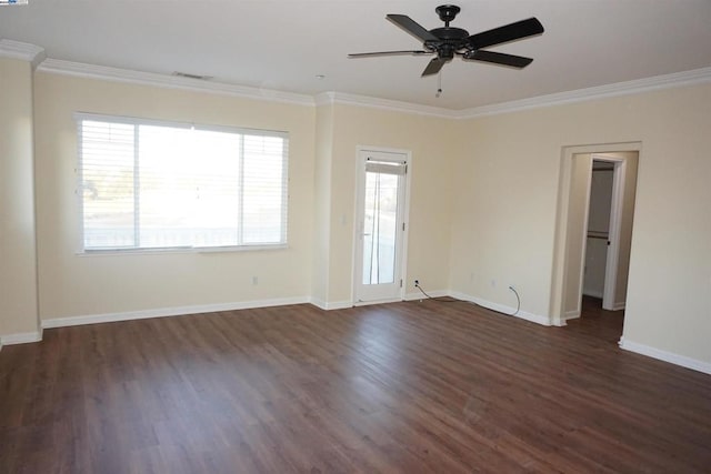 unfurnished room with plenty of natural light, dark hardwood / wood-style floors, crown molding, and ceiling fan