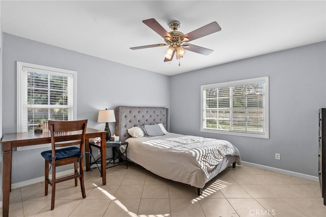 bedroom featuring ceiling fan and light tile patterned floors