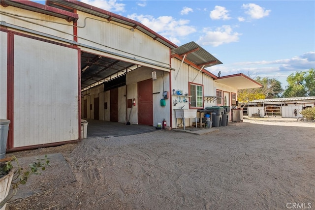 exterior space featuring an outbuilding