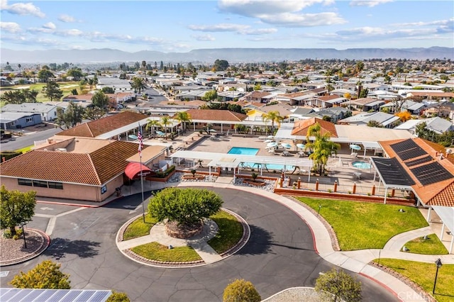 birds eye view of property featuring a mountain view